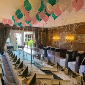 birthday balloon ceiling and table decor