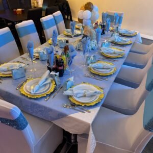 Christening table decor with balloon bear centerpiece